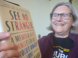 Sister Simone Campbell with See No Stranger book